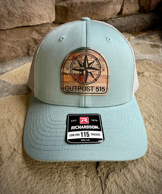 Front view Smoked Blue Outpost 515 Compass Hat 